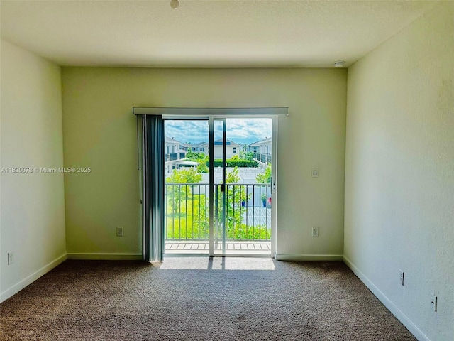 1672 SE 8th Ave, Homestead, FL 33034 - carpeted empty room featuring baseboards