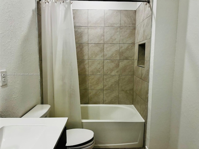 1672 SE 8th Ave, Homestead, FL 33034 - bathroom featuring a textured wall, shower / tub combo with curtain, and vanity