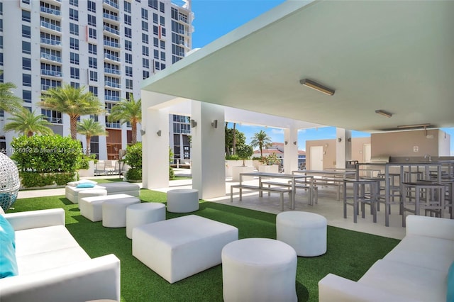 600 NE 27th St Unit 1105, Miami, FL 33137 - view of patio / terrace featuring an outdoor hangout area and an outdoor kitchen