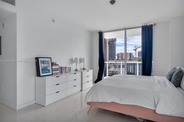 600 NE 27th St Unit 1105, Miami, FL 33137 - bedroom with a view of city and a wall of windows