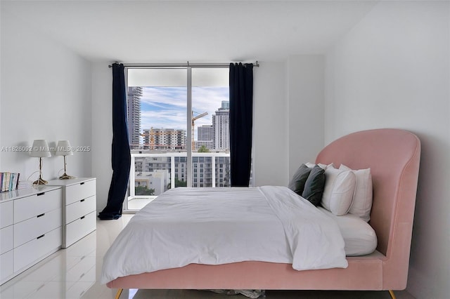 600 NE 27th St Unit 1105, Miami, FL 33137 - bedroom featuring a view of city and floor to ceiling windows