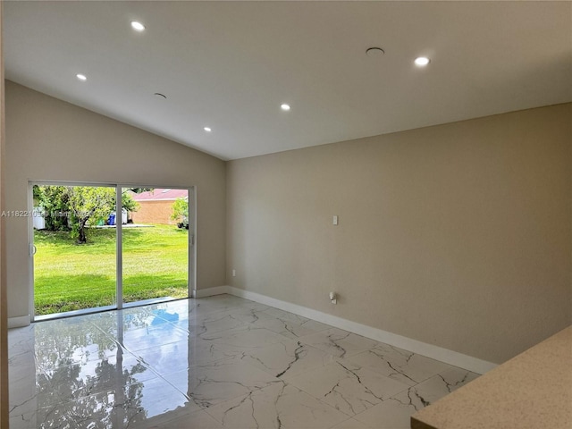 10000 Olive St, Miramar, FL 33025 - empty room with light marble finish flooring, recessed lighting, and lofted ceiling