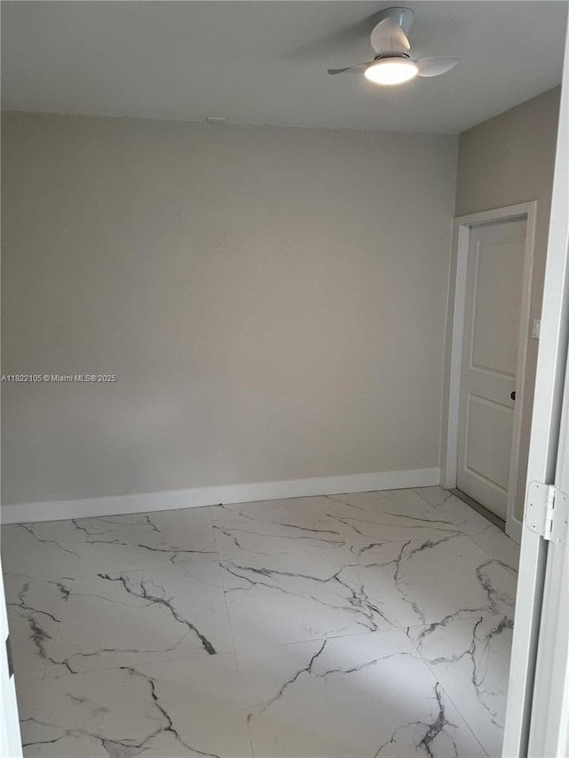 10000 Olive St, Miramar, FL 33025 - empty room with light marble finish flooring and ceiling fan