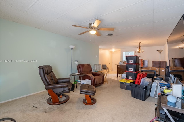 3126 Harbor Blvd Unit 1A, Port Charlotte, FL 33952 - carpeted living room featuring ceiling fan and a chandelier