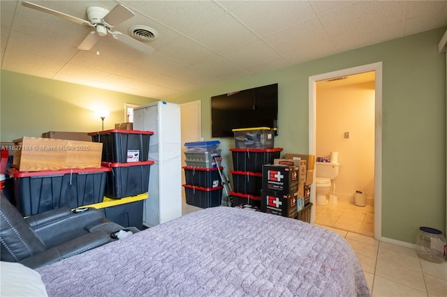 3126 Harbor Blvd Unit 1A, Port Charlotte, FL 33952 - tiled bedroom featuring ensuite bathroom