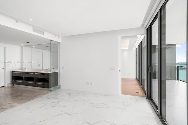 3131 NE 7th Ave Unit 2705, Miami, FL 33137 - unfurnished room featuring light marble finish floors