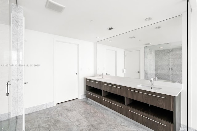 3131 NE 7th Ave Unit 2705, Miami, FL 33137 - bathroom with marble look tiles, a marble finish shower, double vanity, and recessed lighting
