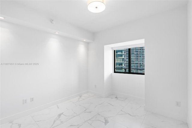 3131 NE 7th Ave Unit 2705, Miami, FL 33137 - empty room with marble finish flooring and recessed lighting