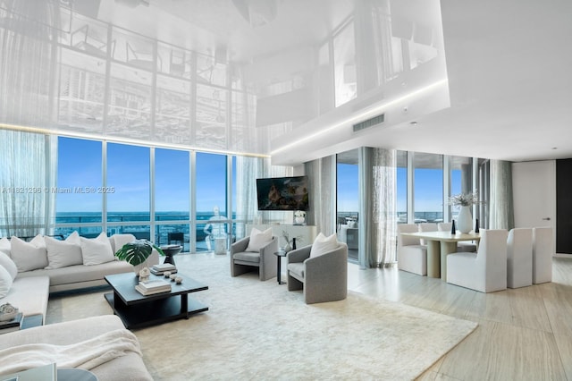 851 NE 1st Ave Unit 5202, Miami, FL 33132 - living room with expansive windows and a high ceiling