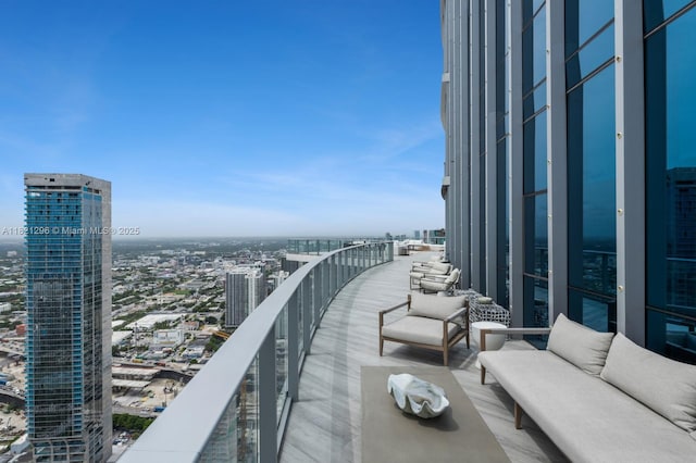 851 NE 1st Ave Unit 5202, Miami, FL 33132 - balcony featuring a view of city and outdoor lounge area