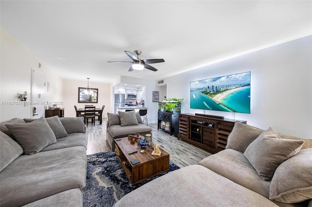 7925 SW 86th St Unit 903, Miami, FL 33143 - living room featuring light wood finished floors and ceiling fan