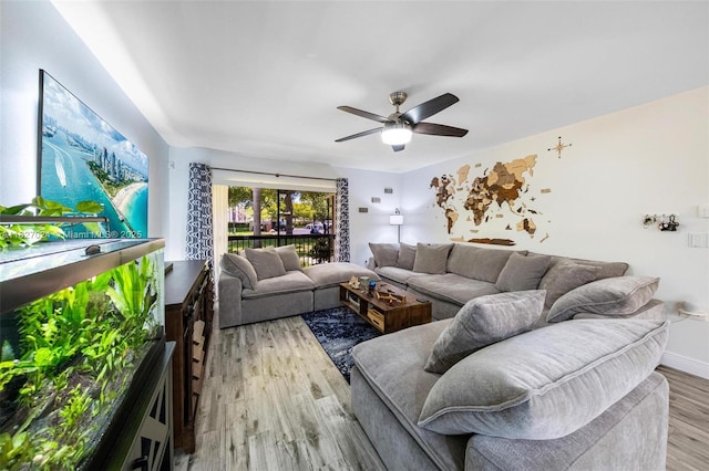7925 SW 86th St Unit 903, Miami, FL 33143 - living area with light wood-type flooring and ceiling fan