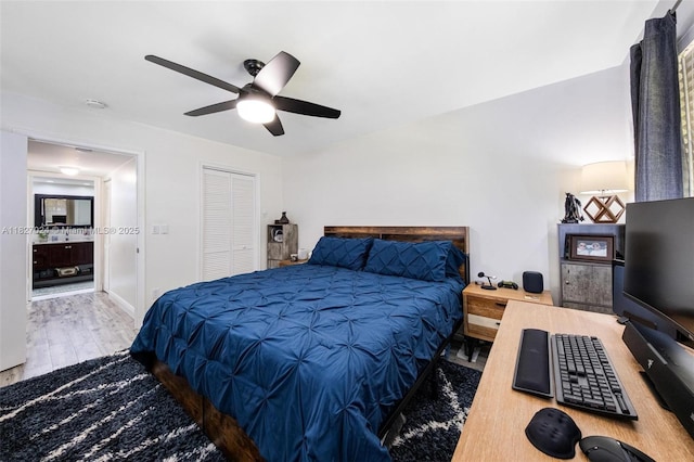 7925 SW 86th St Unit 903, Miami, FL 33143 - bedroom with wood finished floors, ceiling fan, and a closet