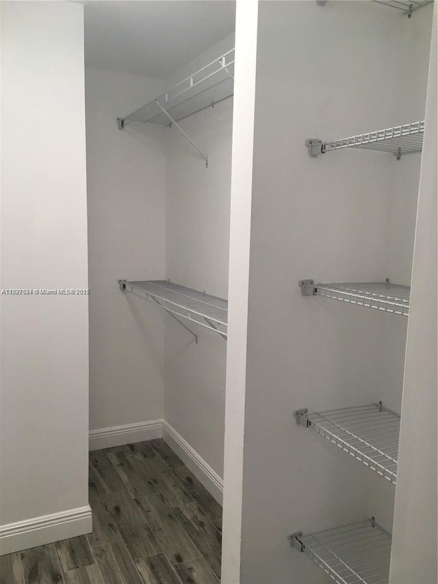 7925 SW 86th St Unit 903, Miami, FL 33143 - spacious closet featuring wood finished floors