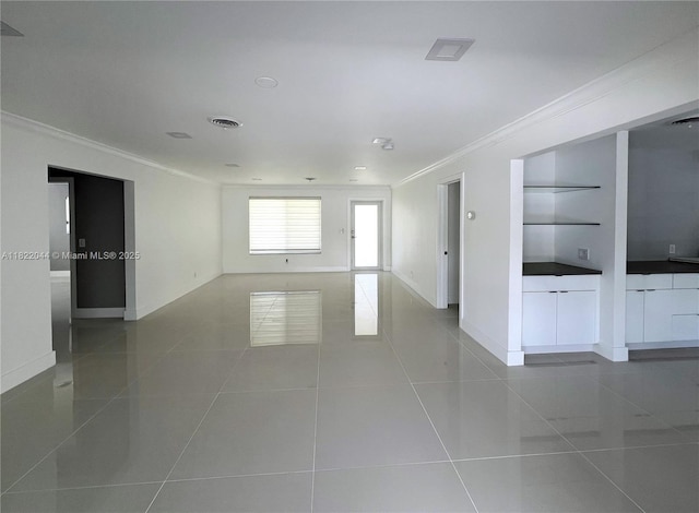 1321 Garfield St, Hollywood, FL 33019 - empty room with crown molding and tile patterned floors