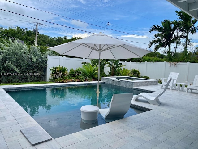 1321 Garfield St, Hollywood, FL 33019 - view of pool with a patio, a fenced backyard, and a pool with connected hot tub