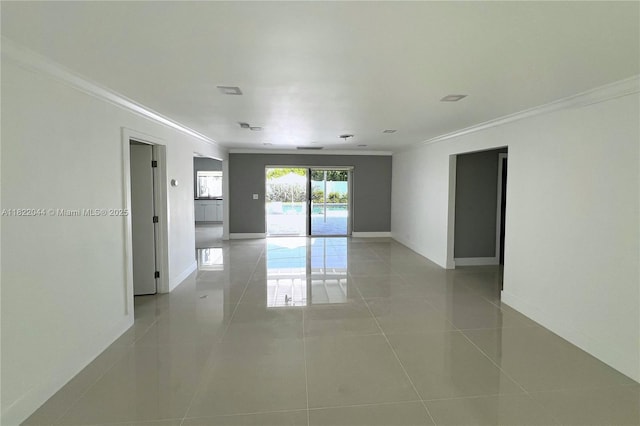 1321 Garfield St, Hollywood, FL 33019 - unfurnished room featuring crown molding and light tile patterned floors