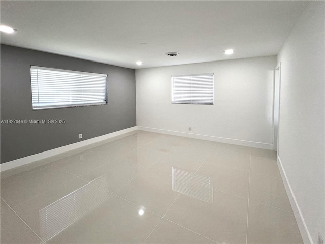 1321 Garfield St, Hollywood, FL 33019 - empty room with light tile patterned flooring and recessed lighting