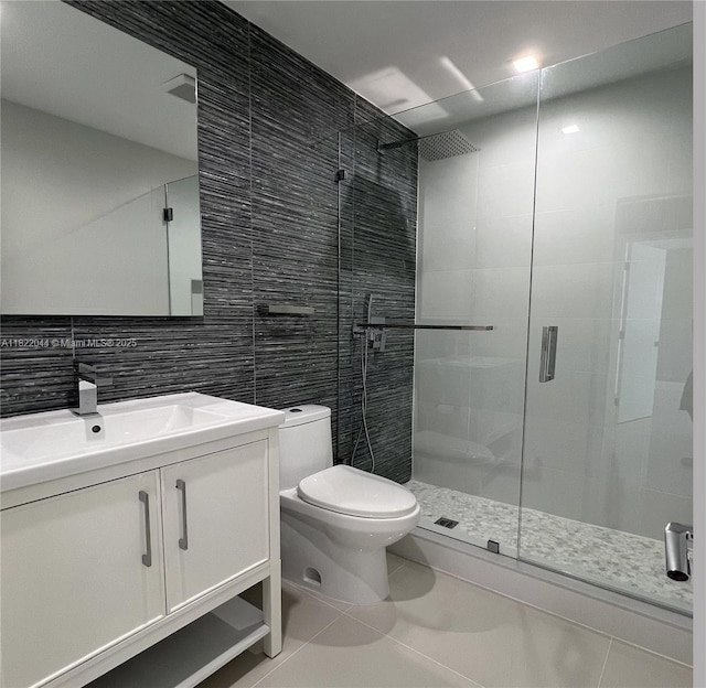 1321 Garfield St, Hollywood, FL 33019 - full bath featuring tile walls, a stall shower, vanity, tile patterned flooring, and decorative backsplash