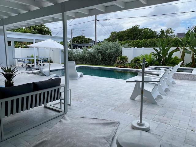 1321 Garfield St, Hollywood, FL 33019 - view of swimming pool featuring a patio, a fenced backyard, and outdoor dining area