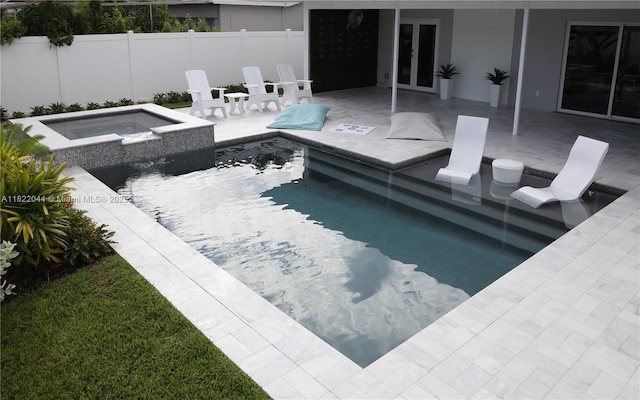 1321 Garfield St, Hollywood, FL 33019 - view of swimming pool with french doors, a patio area, and a pool with connected hot tub