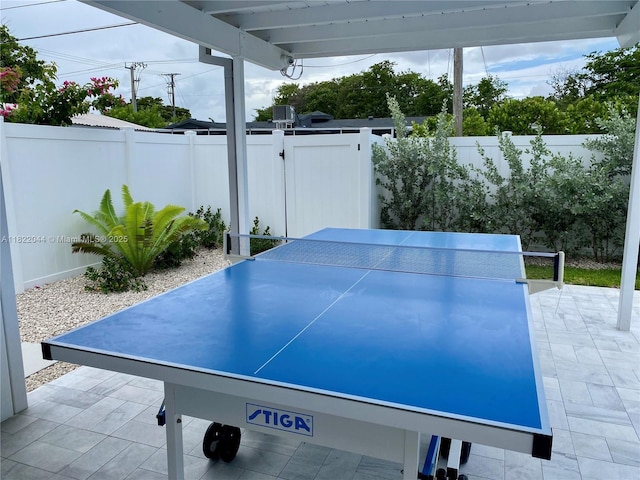 1321 Garfield St, Hollywood, FL 33019 - fenced backyard with a patio area