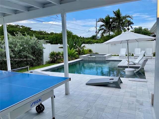 1321 Garfield St, Hollywood, FL 33019 - view of pool with a fenced backyard, a patio, and a pool with connected hot tub