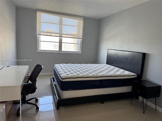 300 Bayview Dr Unit 1009, Sunny Isles Beach, FL 33160 - bedroom featuring an office area and tile patterned flooring