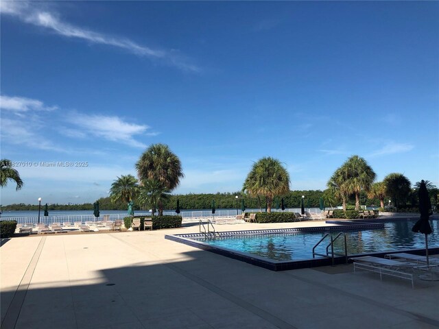 300 Bayview Dr Unit 1009, Sunny Isles Beach, FL 33160 - community pool featuring a patio area