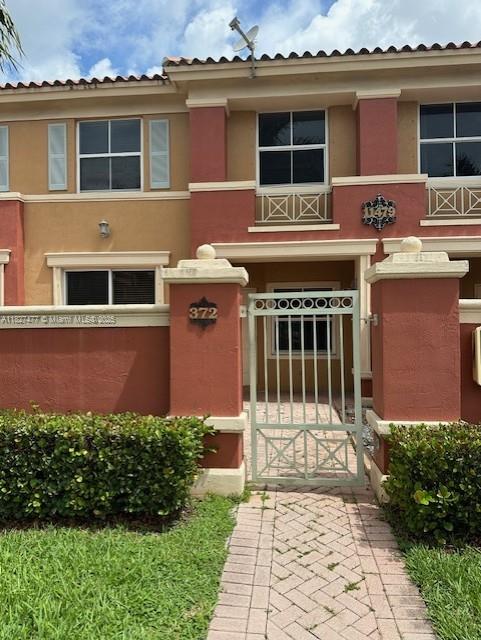 11479 NW 60th Ter Unit 372, Doral, FL 33178 - view of front of house with stucco siding