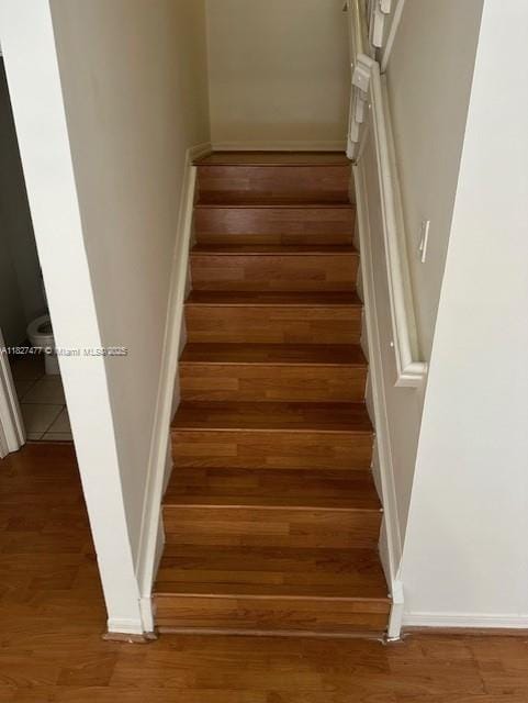 11479 NW 60th Ter Unit 372, Doral, FL 33178 - stairs featuring wood finished floors