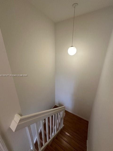 11479 NW 60th Ter Unit 372, Doral, FL 33178 - staircase featuring hardwood / wood-style flooring