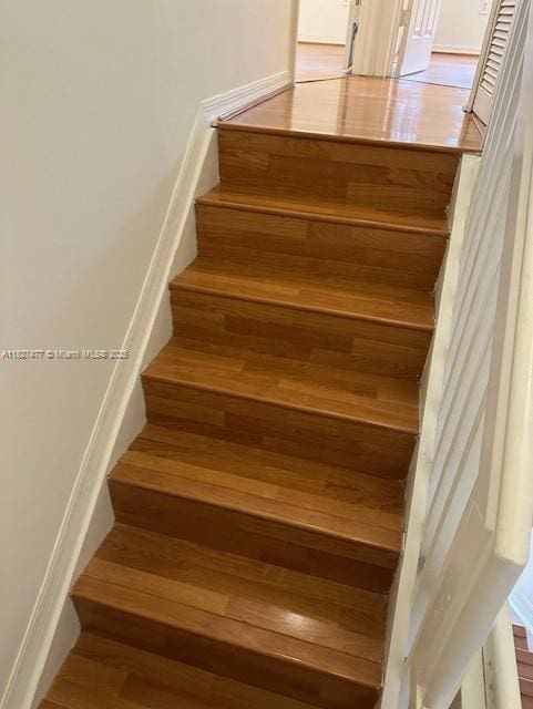 11479 NW 60th Ter Unit 372, Doral, FL 33178 - staircase with wood finished floors
