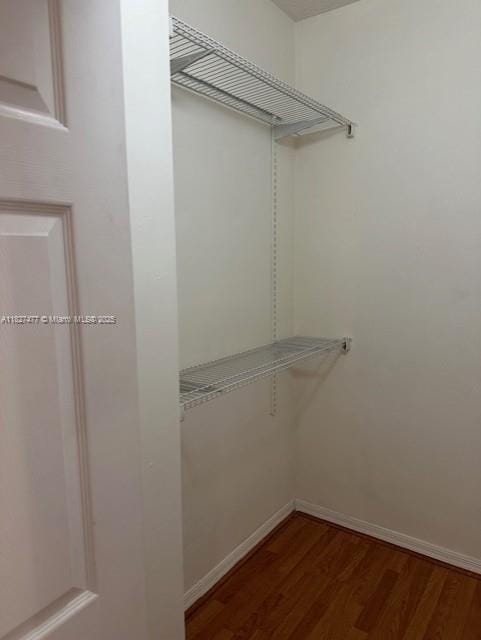 11479 NW 60th Ter Unit 372, Doral, FL 33178 - spacious closet with wood finished floors