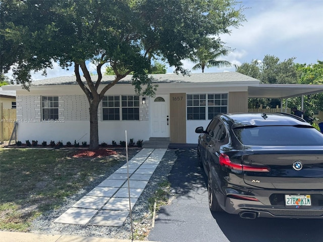 1657 SW 44th Ave, Fort Lauderdale, FL 33317 - ranch-style home with a carport