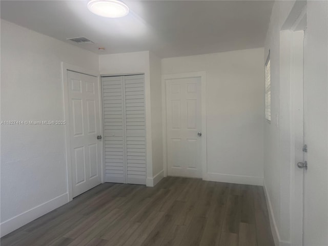 1657 SW 44th Ave, Fort Lauderdale, FL 33317 - unfurnished bedroom featuring wood finished floors and a closet