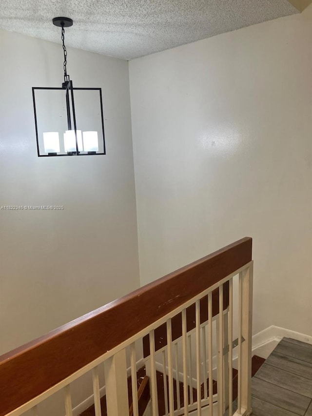 2326 SW 82nd Ter, North Lauderdale, FL 33068 - staircase with a textured ceiling