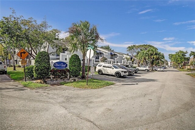 2326 SW 82nd Ter, North Lauderdale, FL 33068 - view of asphalt street featuring traffic signs and a residential view