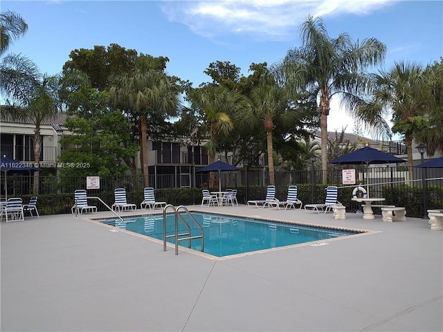 2326 SW 82nd Ter, North Lauderdale, FL 33068 - community pool with a patio