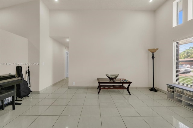 4947 NW 91st Ter, Sunrise, FL 33351 - unfurnished room featuring a high ceiling, light tile patterned flooring, and recessed lighting