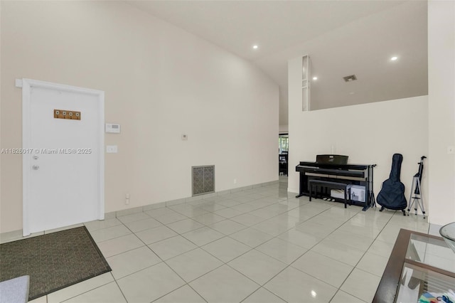 4947 NW 91st Ter, Sunrise, FL 33351 - living area with high vaulted ceiling, light tile patterned floors, and recessed lighting