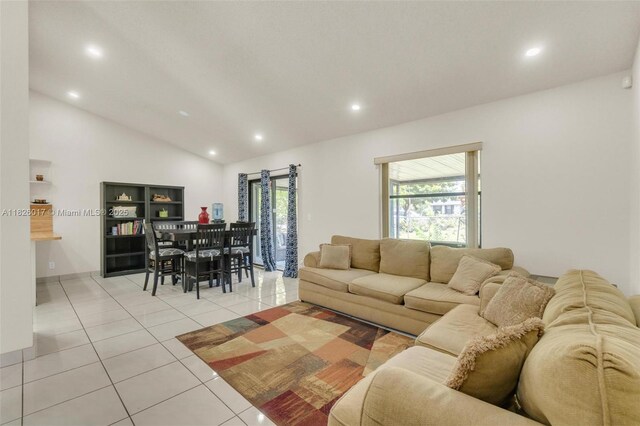 4947 NW 91st Ter, Sunrise, FL 33351 - living room featuring light tile patterned floors, recessed lighting, and high vaulted ceiling