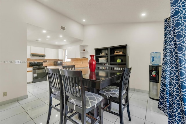 4947 NW 91st Ter, Sunrise, FL 33351 - dining space featuring recessed lighting and light tile patterned flooring