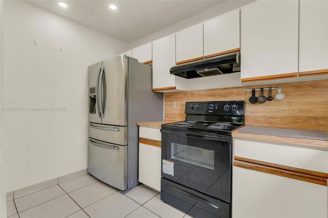 4947 NW 91st Ter, Sunrise, FL 33351 - kitchen featuring black electric range oven, under cabinet range hood, stainless steel fridge, light countertops, and white cabinetry