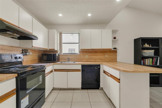 4947 NW 91st Ter, Sunrise, FL 33351 - kitchen featuring black appliances, a peninsula, under cabinet range hood, open shelves, and decorative backsplash