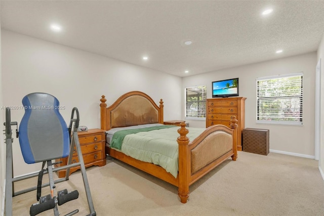 4947 NW 91st Ter, Sunrise, FL 33351 - bedroom featuring recessed lighting, light carpet, multiple windows, and a textured ceiling