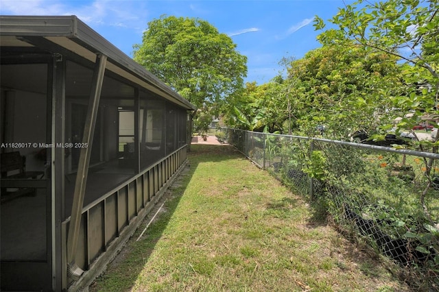 4947 NW 91st Ter, Sunrise, FL 33351 - view of yard with a sunroom