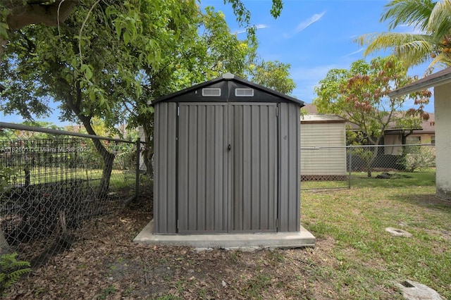 4947 NW 91st Ter, Sunrise, FL 33351 - view of shed with a fenced backyard