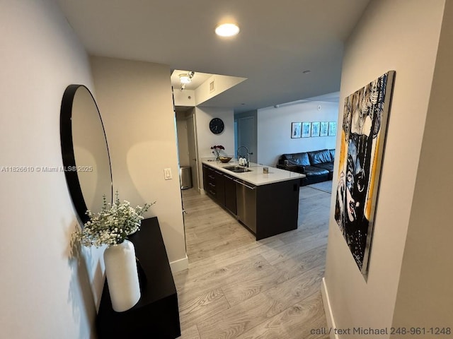500 Brickell Ave Unit 3803, Miami, FL 33131 - kitchen featuring light wood finished floors, light countertops, and recessed lighting