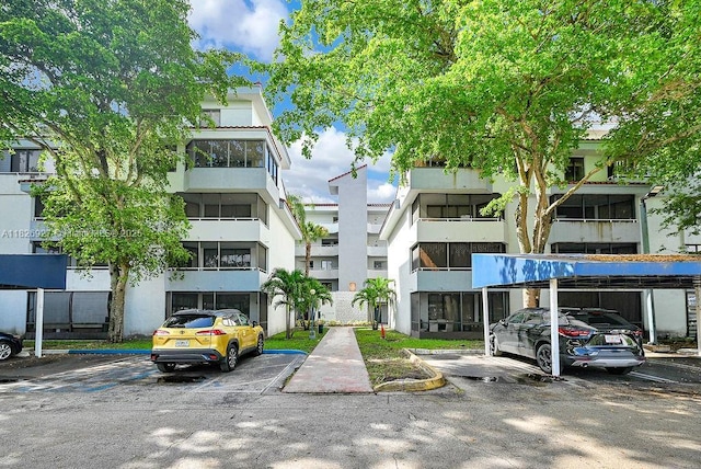 8365 SW 152nd Ave Unit C-201, Miami, FL 33193 - view of apartment building / complex with covered and uncovered parking